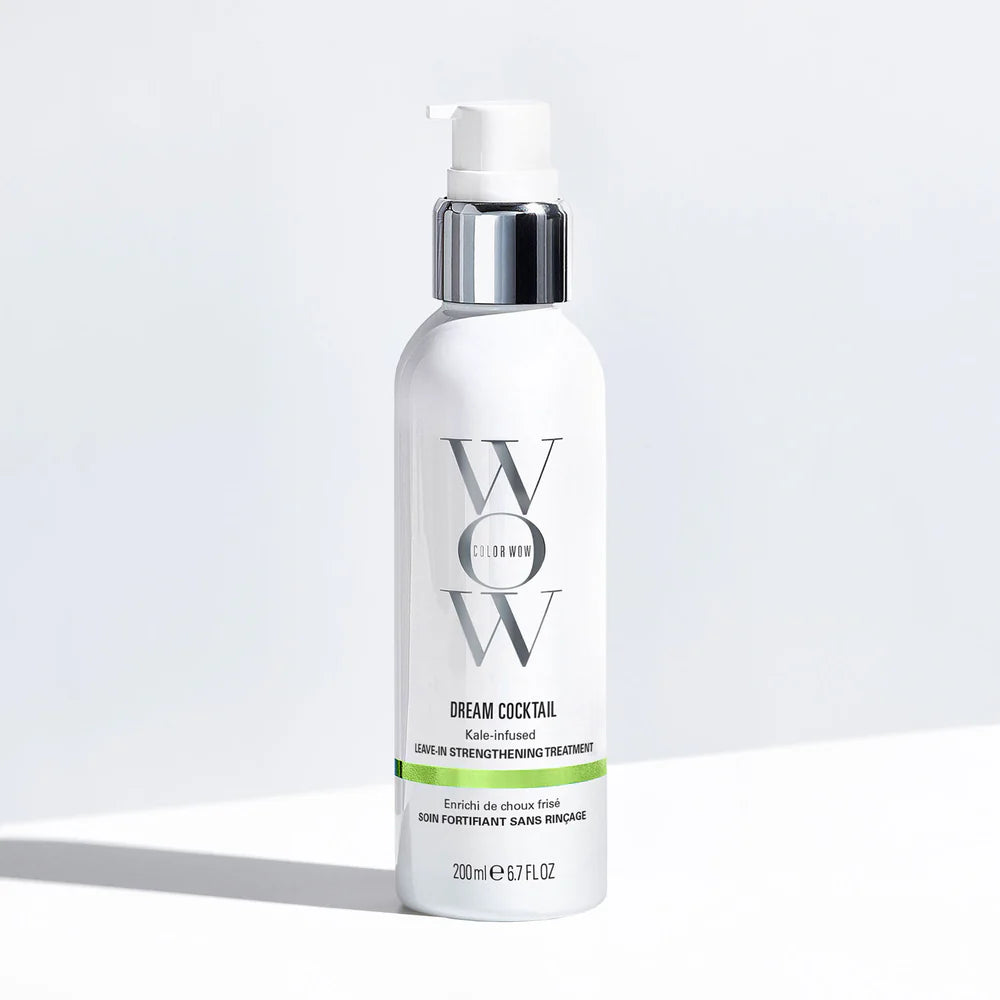 Bottle of WOW Dream Cocktail hair treatment on a light gray background